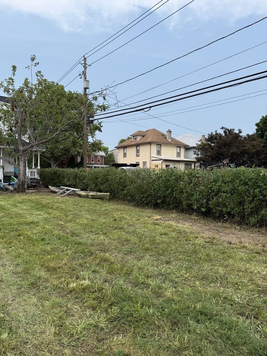 Same lot cut and cleaned up, hedge line clear